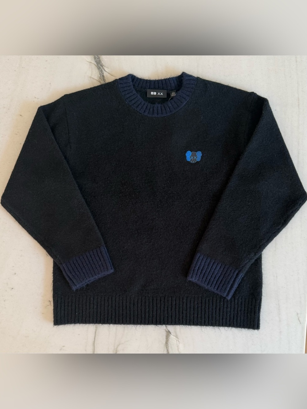 Uniqlo KAWS Colab, Boys, Size 7-8, Black Crewneck Sweater with Blue KAWS Motif.